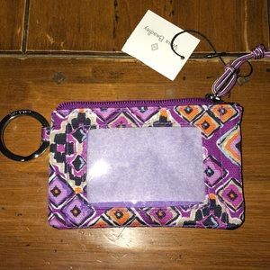 Vera Bradley zip ID case in purple.